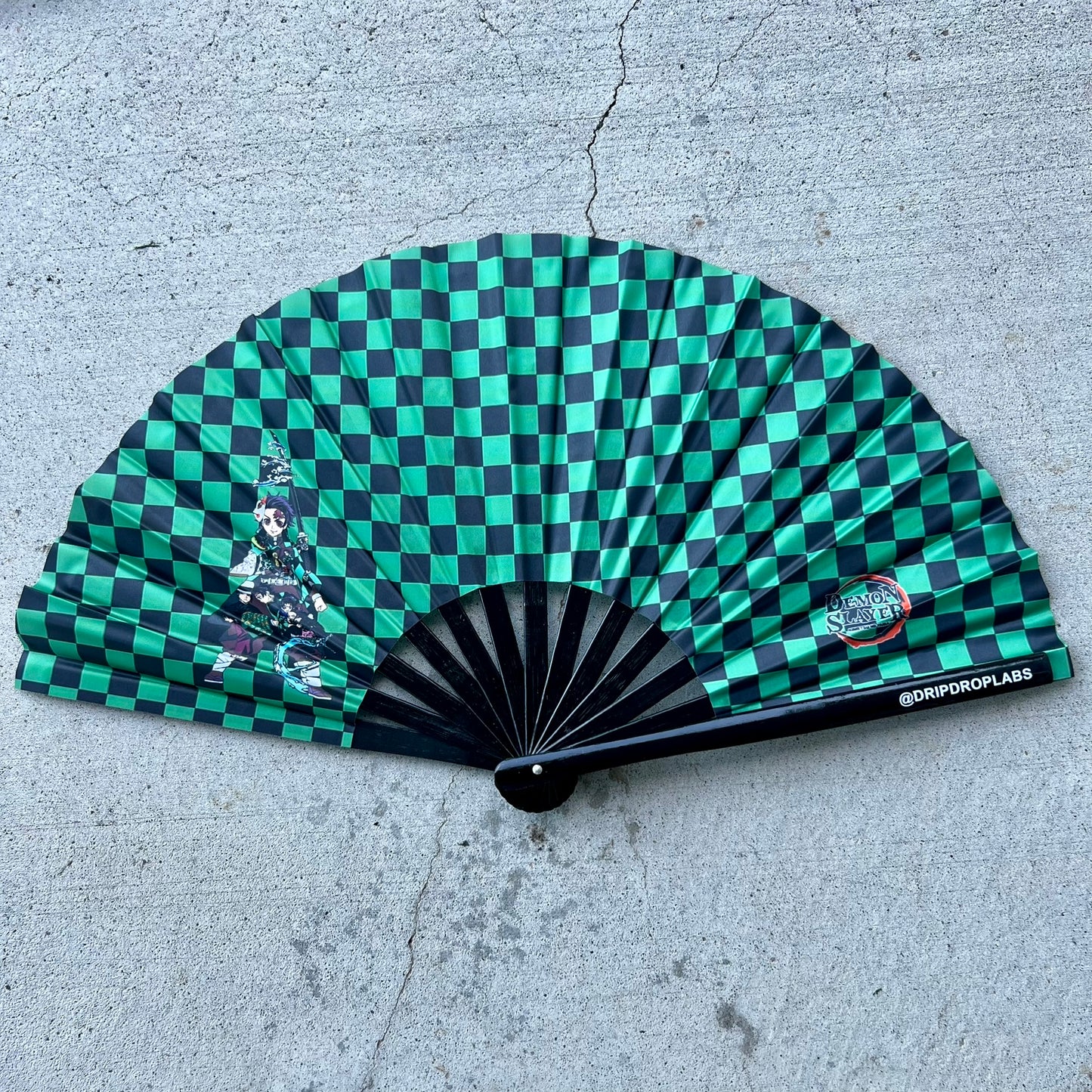 Drip Drop Labs Slayer Sun Breathing glow fan with vibrant LED lights, portable handheld fan designed for cooling and style.