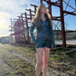 Drip Drop Labs Glitch Instinct hooded rave romper with cyber animal design, featuring vibrant colors and futuristic style.