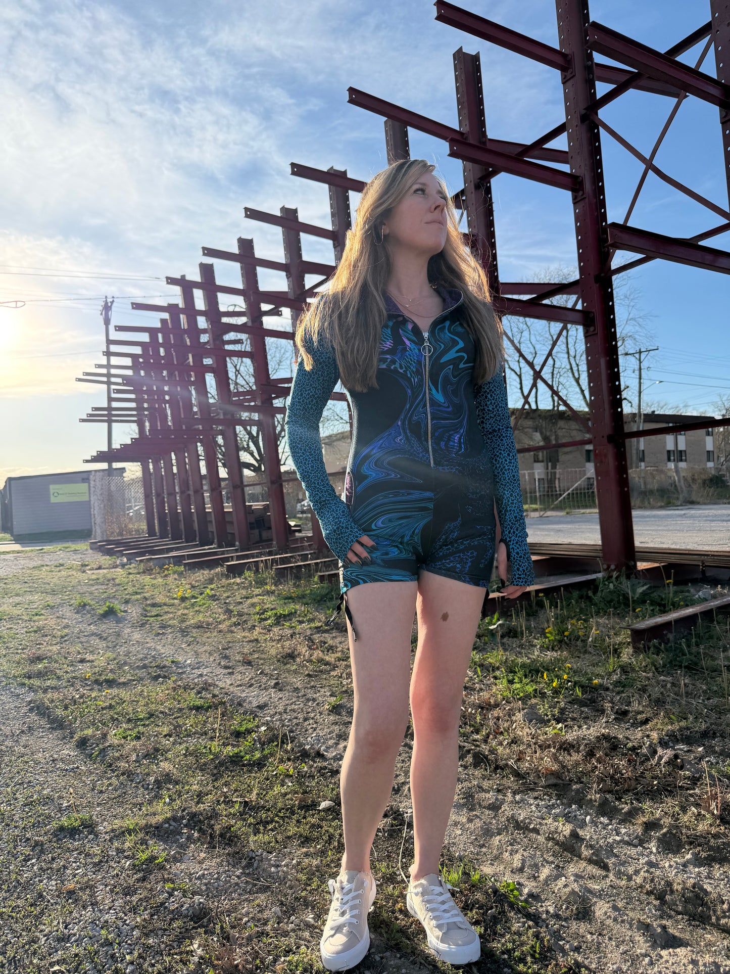 Drip Drop Labs Glitch Instinct hooded rave romper with cyber animal design, featuring vibrant colors and futuristic style.