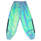 Reflective parachute pants from Drip Drop Labs featuring shiny fabric, adjustable waistband, and relaxed fit.