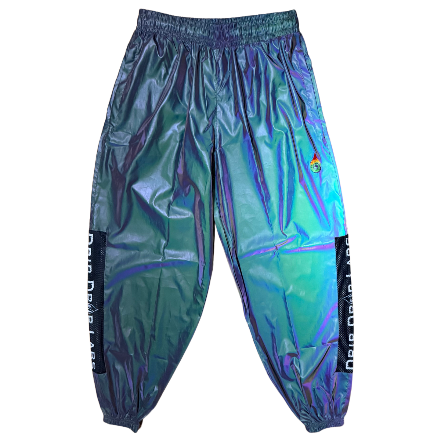 Reflective parachute pants by Drip Drop Labs featuring shiny, metallic fabric and adjustable waistband on a white background.