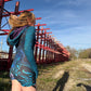 Drip Drop Labs Glitch Instinct Hooded Rave Romper with cyber animal design, featuring a hood and vibrant festival-inspired details.