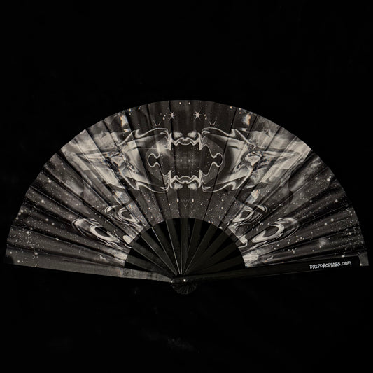 Black and white fan with abstract design on a black background