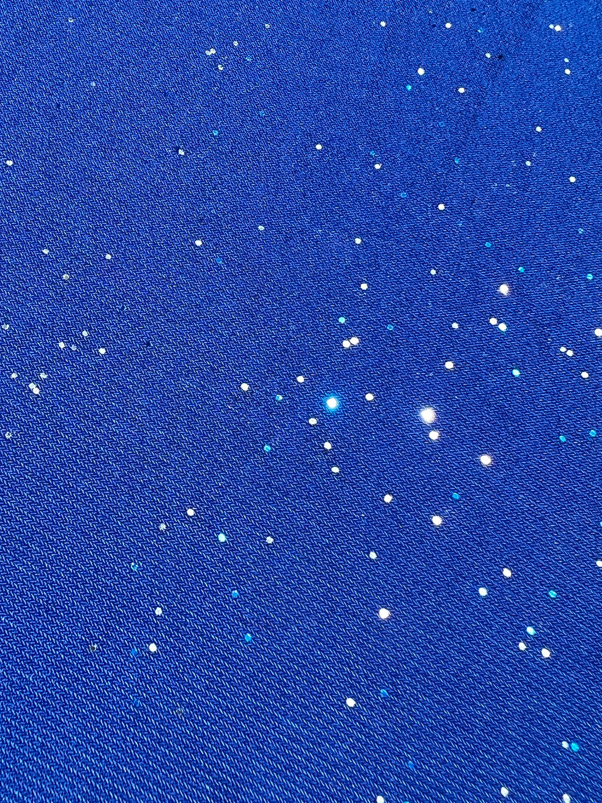 Blue Galactic Pashmina scarf by Drip Drop Labs, showcasing soft fabric with a cosmic galaxy pattern and luxurious texture.