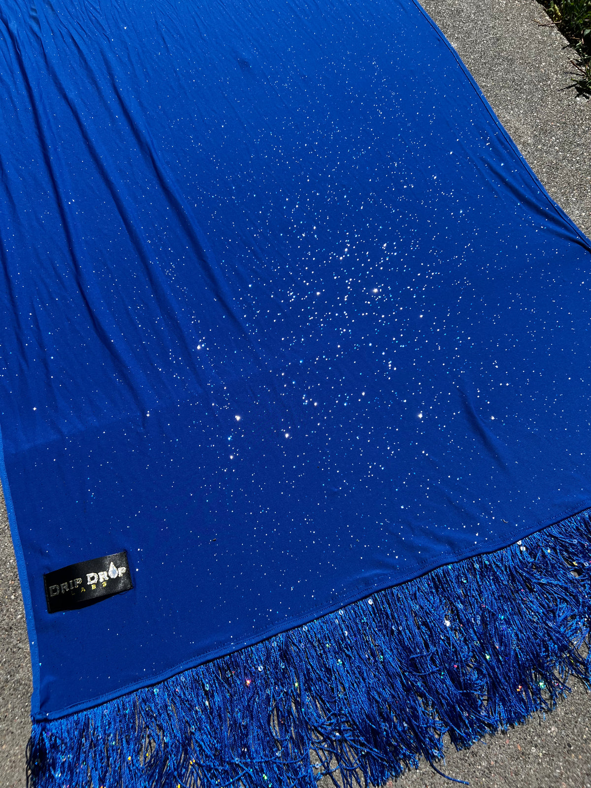 Blue Galactic Pashmina scarf by Drip Drop Labs featuring soft, luxurious fabric with a cosmic galaxy pattern.