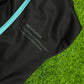 Drip Drop Labs Arise hooded baseball jersey with bold design, featuring a black and white color scheme and athletic fit.
