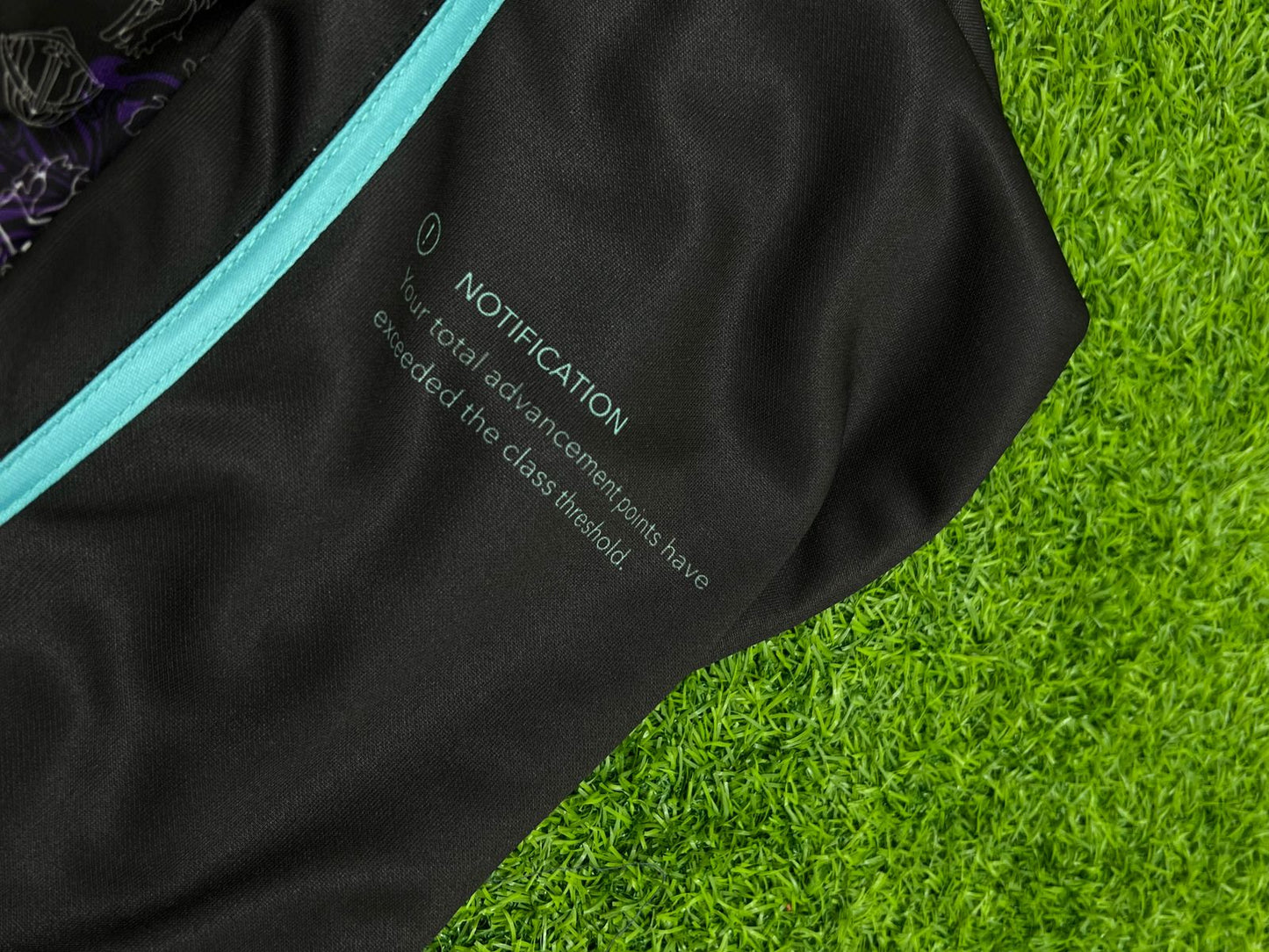 Drip Drop Labs Arise hooded baseball jersey with bold design, featuring a black and white color scheme and athletic fit.