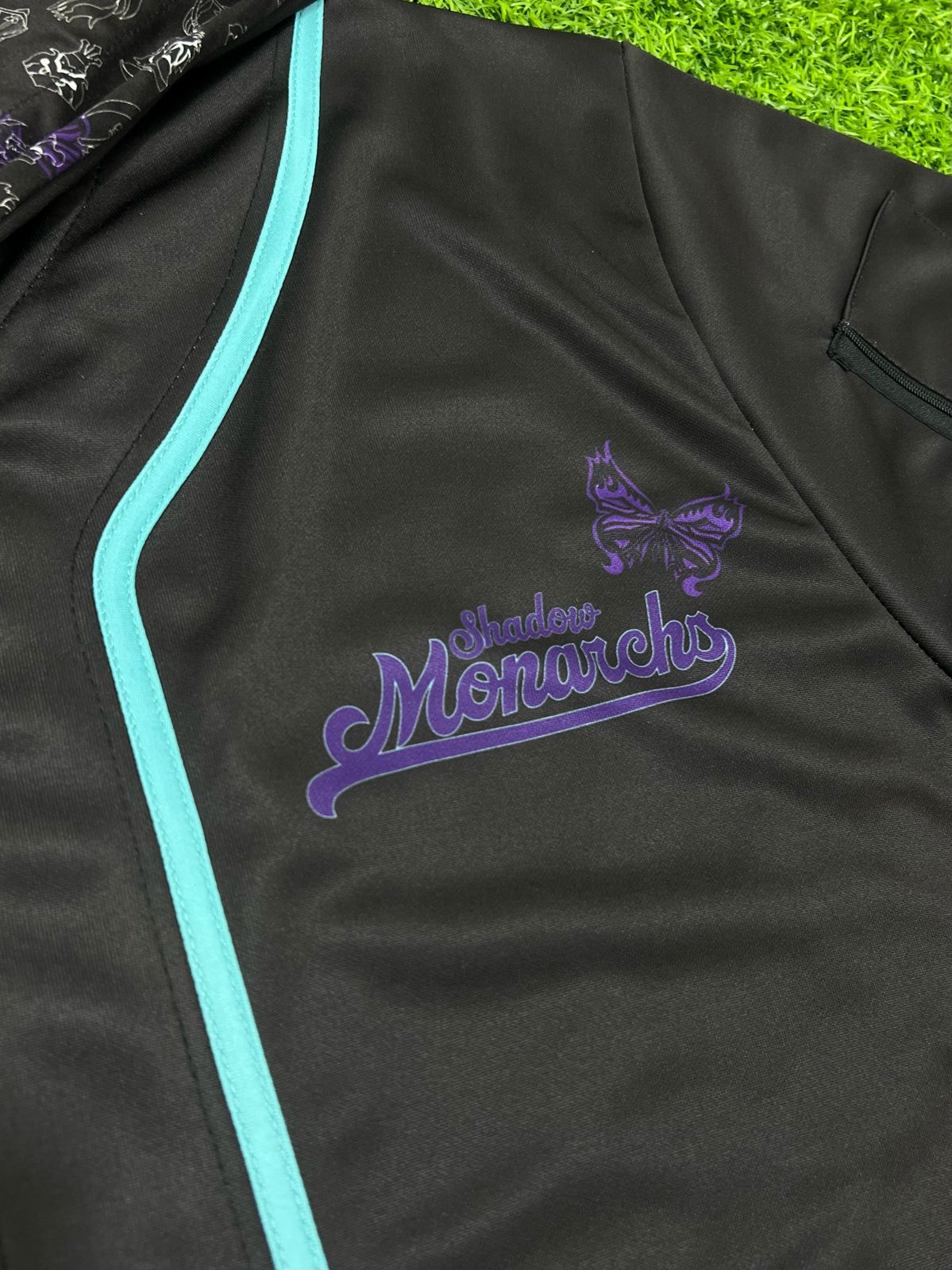 Drip Drop Labs Arise hooded baseball jersey featuring a stylish design with a hood, perfect for casual or rave wear.