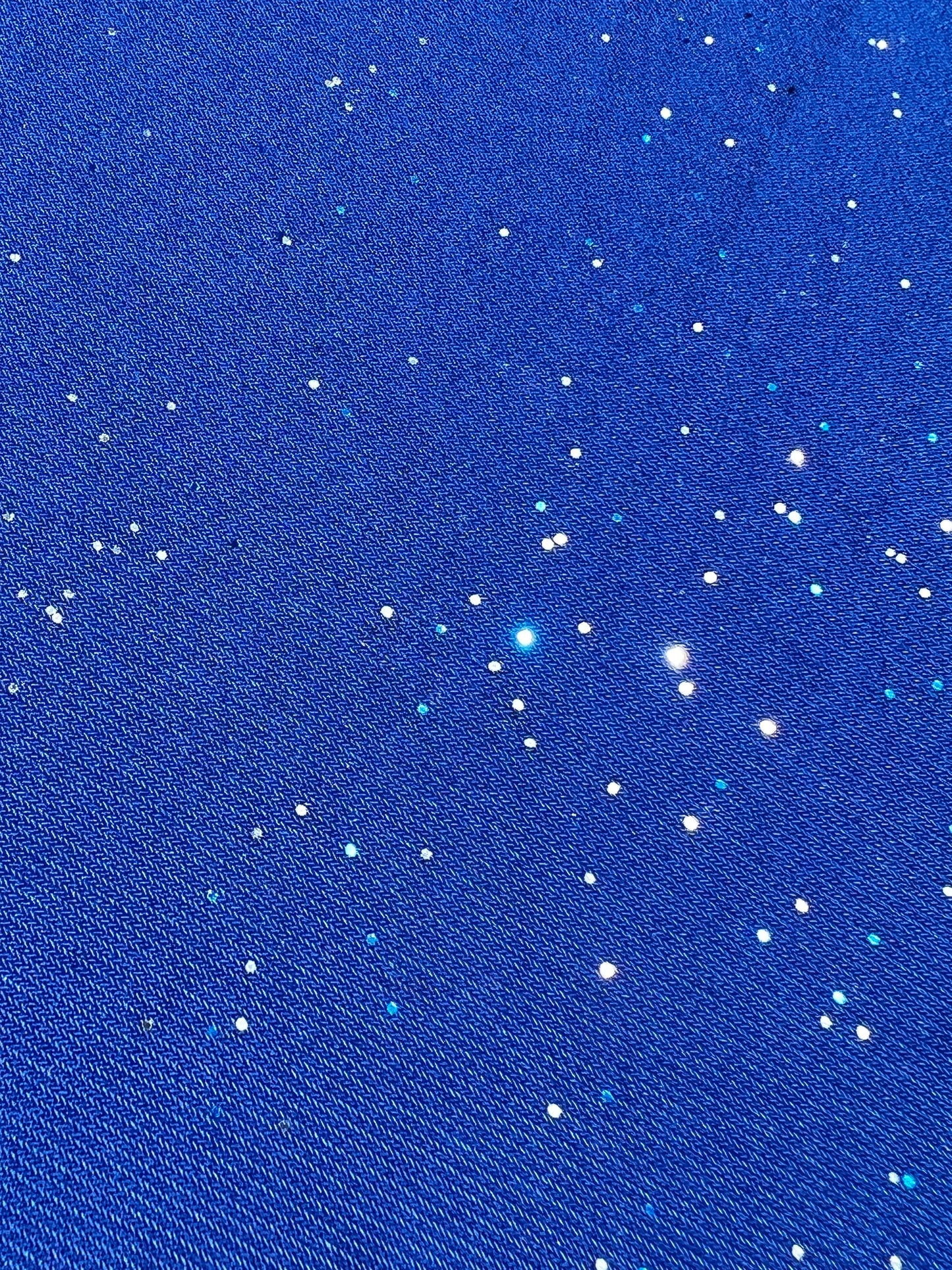 Blue Galactic Pashmina scarf by Drip Drop Labs, showcasing soft fabric with a cosmic galaxy pattern and luxurious texture.