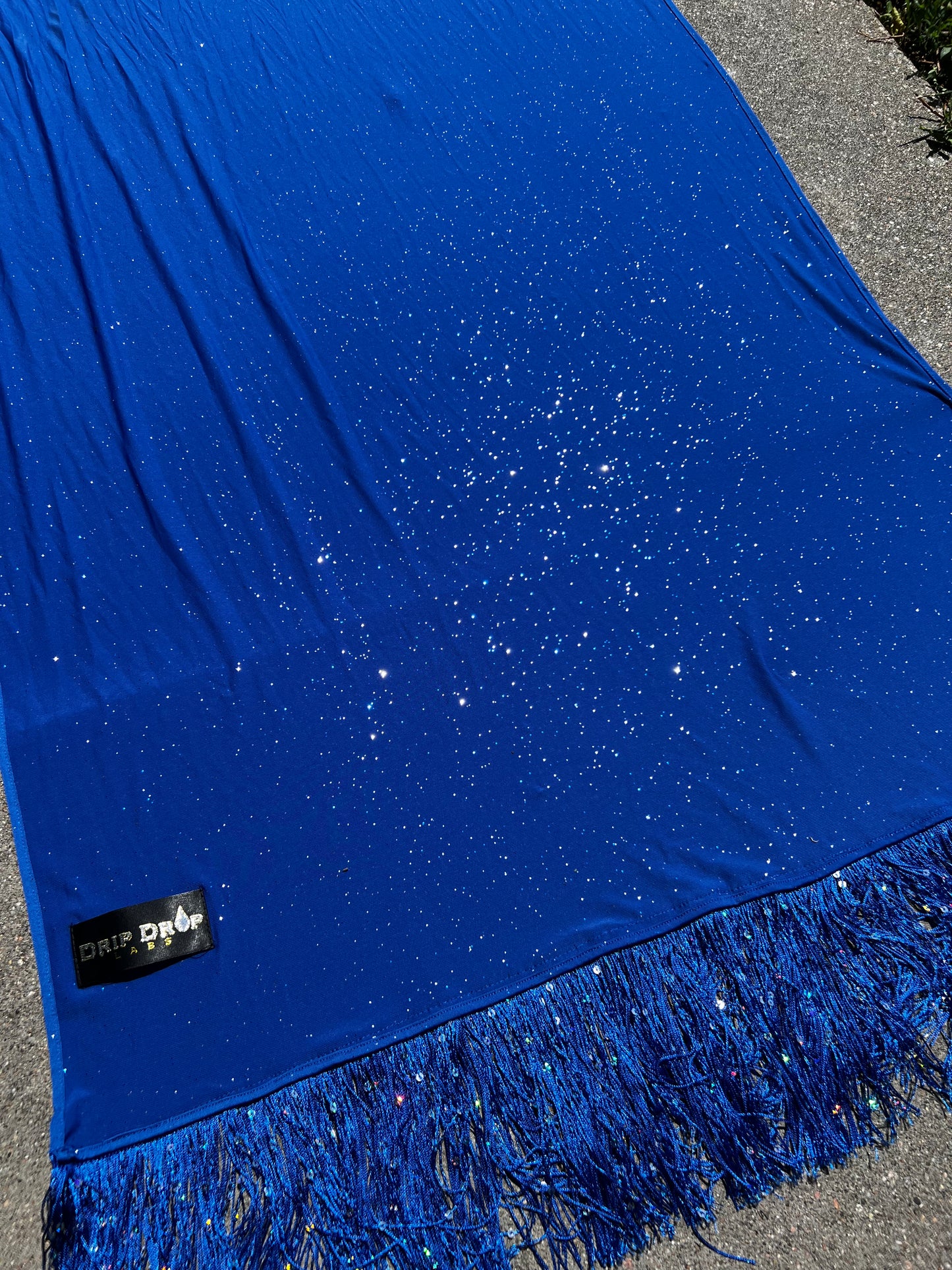 Blue Galactic Pashmina scarf by Drip Drop Labs featuring soft, luxurious fabric with a cosmic galaxy pattern.