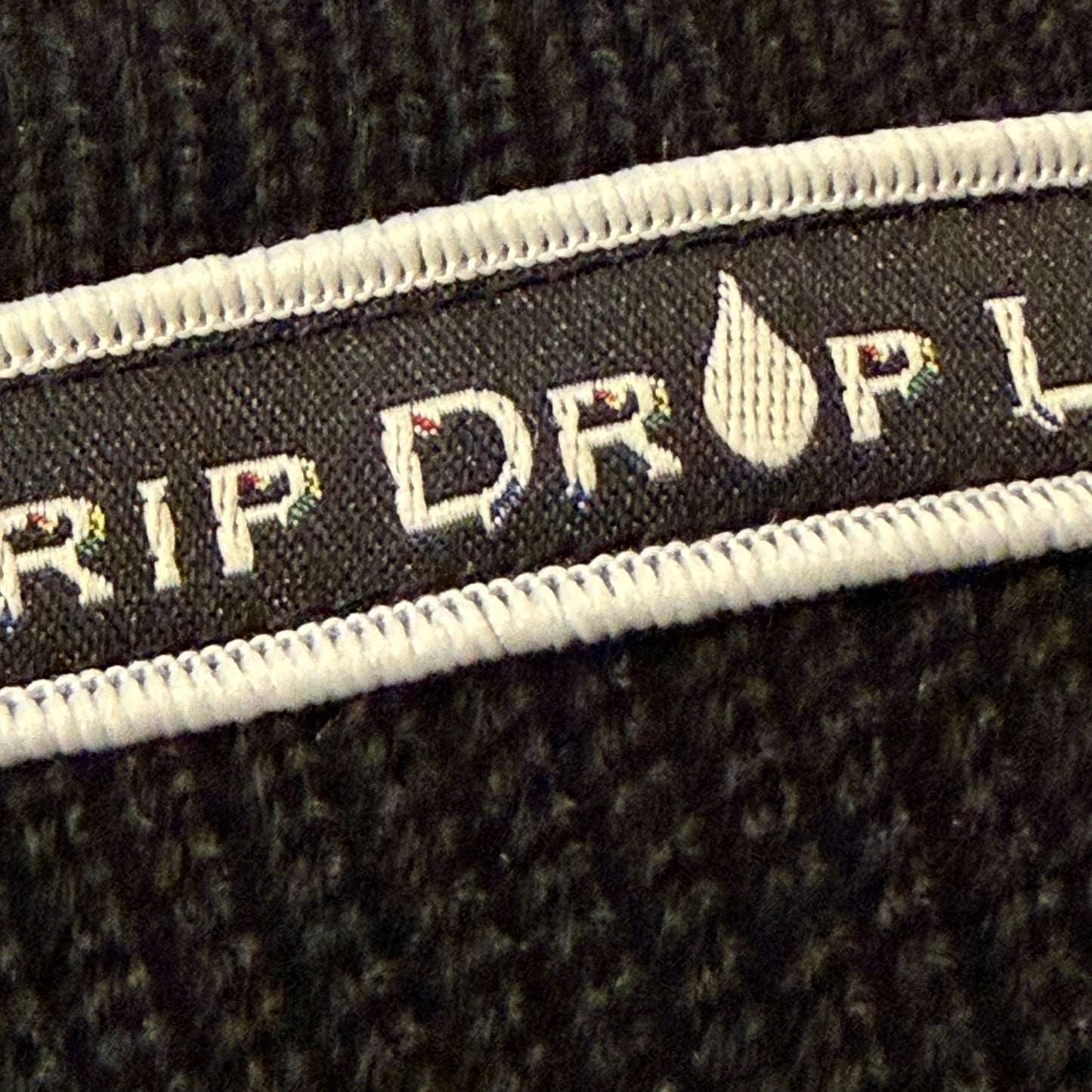 Drip Drop Labs beanie in black with embroidered logo, cozy knit fabric for warmth and casual style.