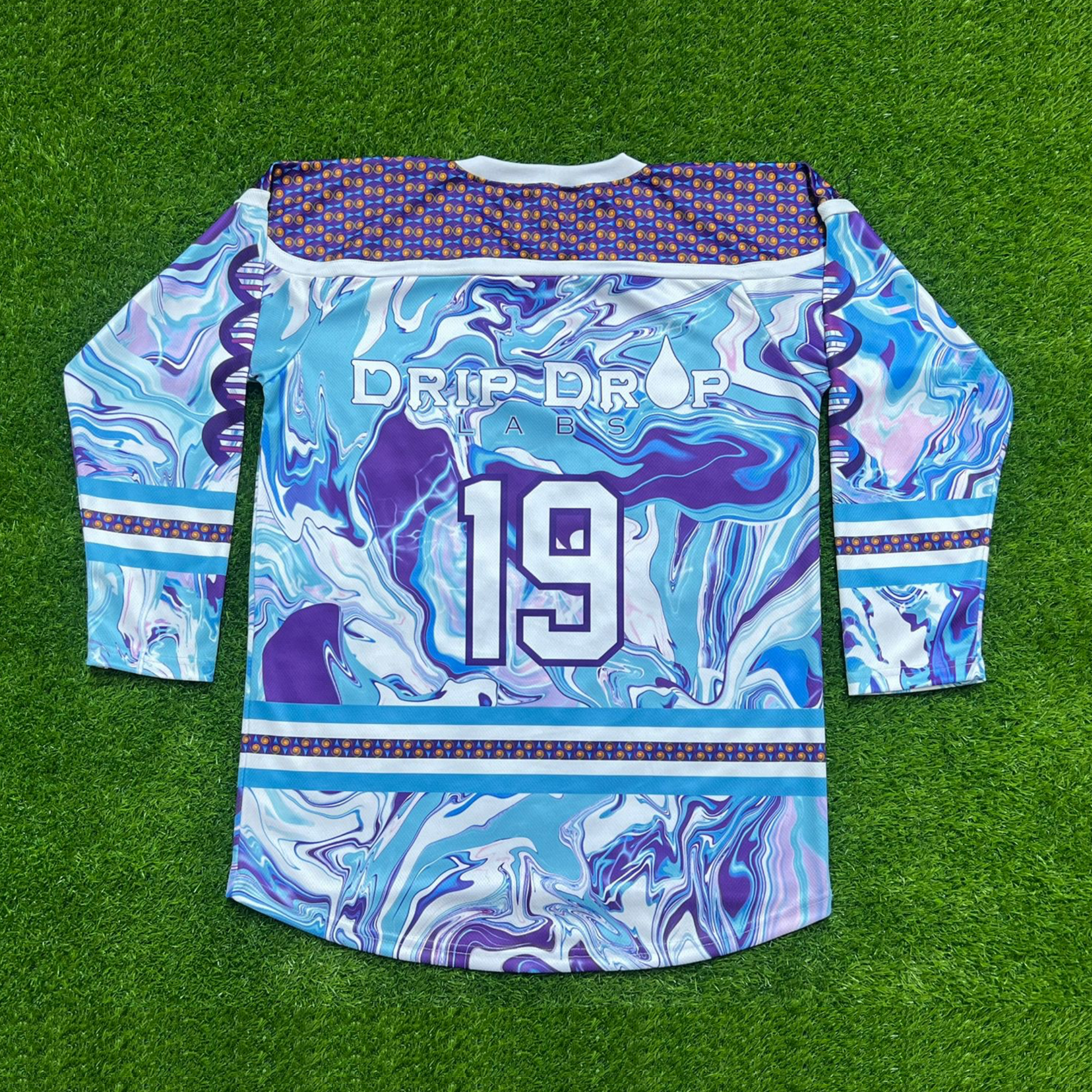 Drip Drop Labs Chill Drip Hockey Jersey featuring vibrant colors and bold design, made from breathable fabric.