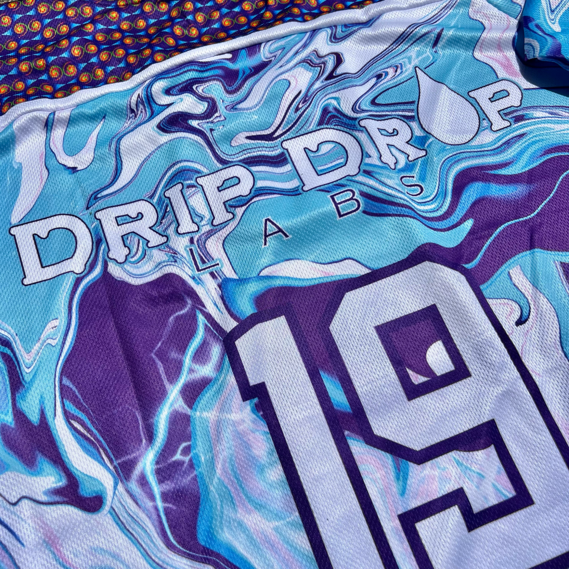 Drip Drop Labs Chill Drip Hockey Jersey featuring vibrant colors and hockey-inspired design, made for stylish athletic wear.