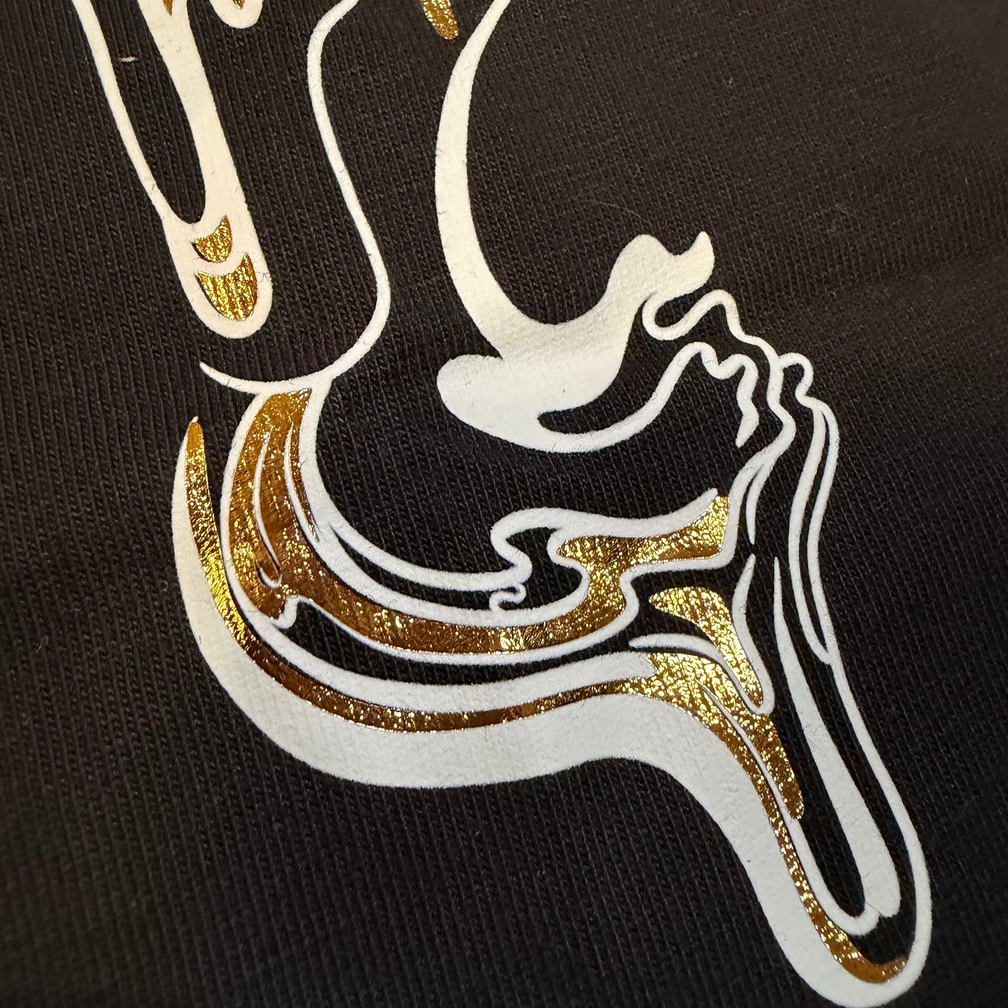 Golden Flow Tee by Drip Drop Labs, stylish black T-shirt with gold logo design, casual and comfortable for everyday wear.