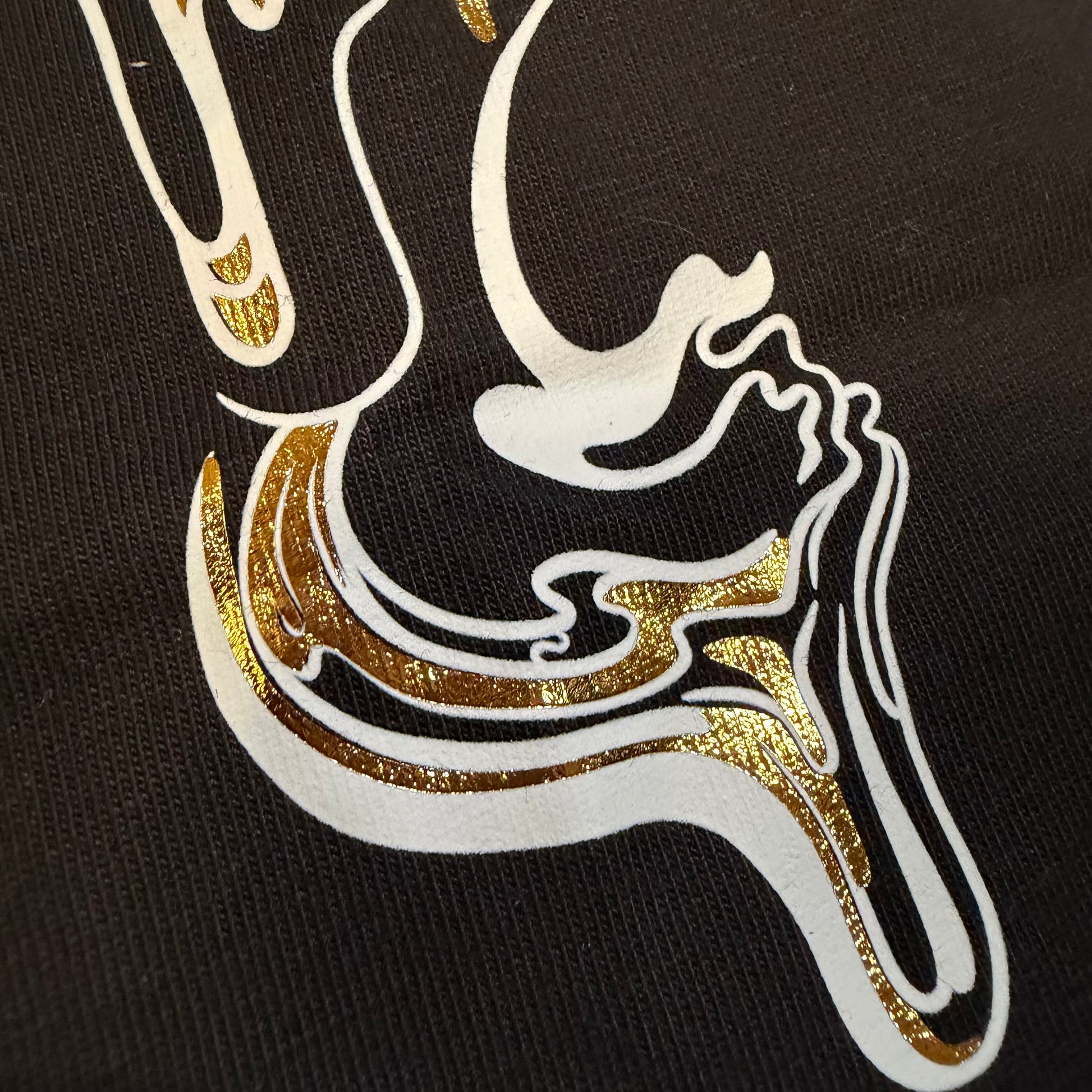 Golden Flow Tee by Drip Drop Labs, stylish black T-shirt with gold logo design, casual and comfortable for everyday wear.