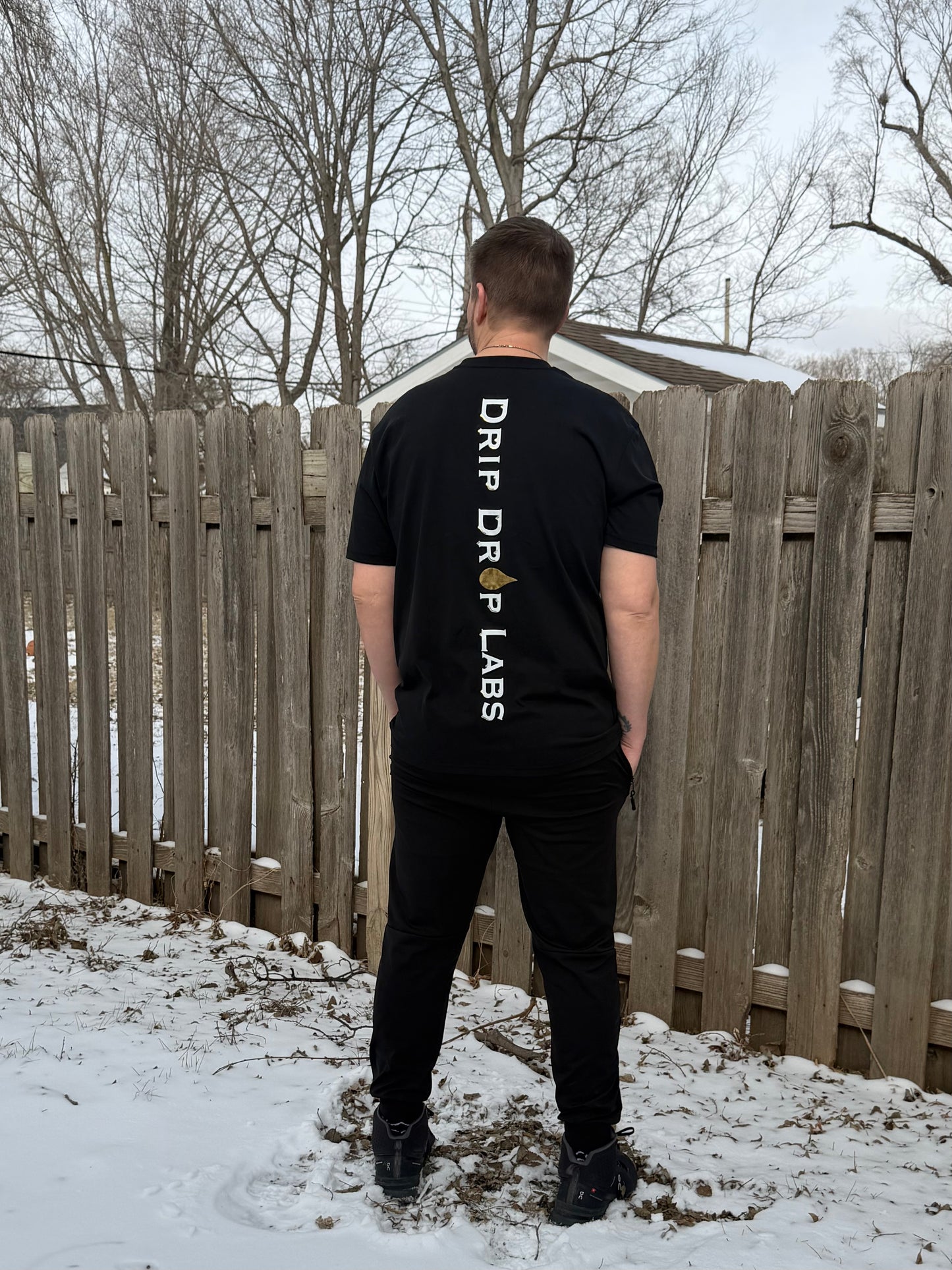 Golden Flow Tee by Drip Drop Labs featuring a stylish design on a comfortable T-shirt.