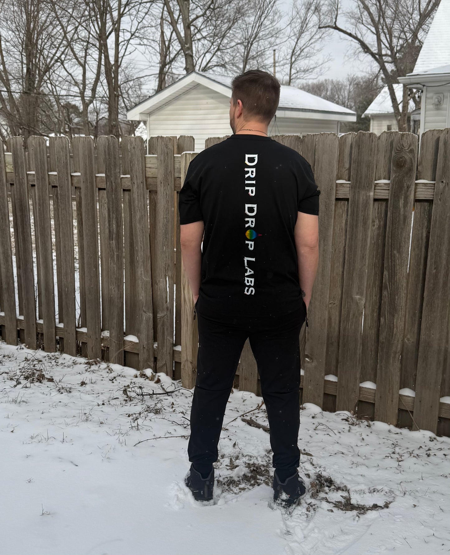 Drip Drop Labs Prism Flow Tee: black T-shirt with colorful geometric prism design on the front, casual fit, men's fashion.
