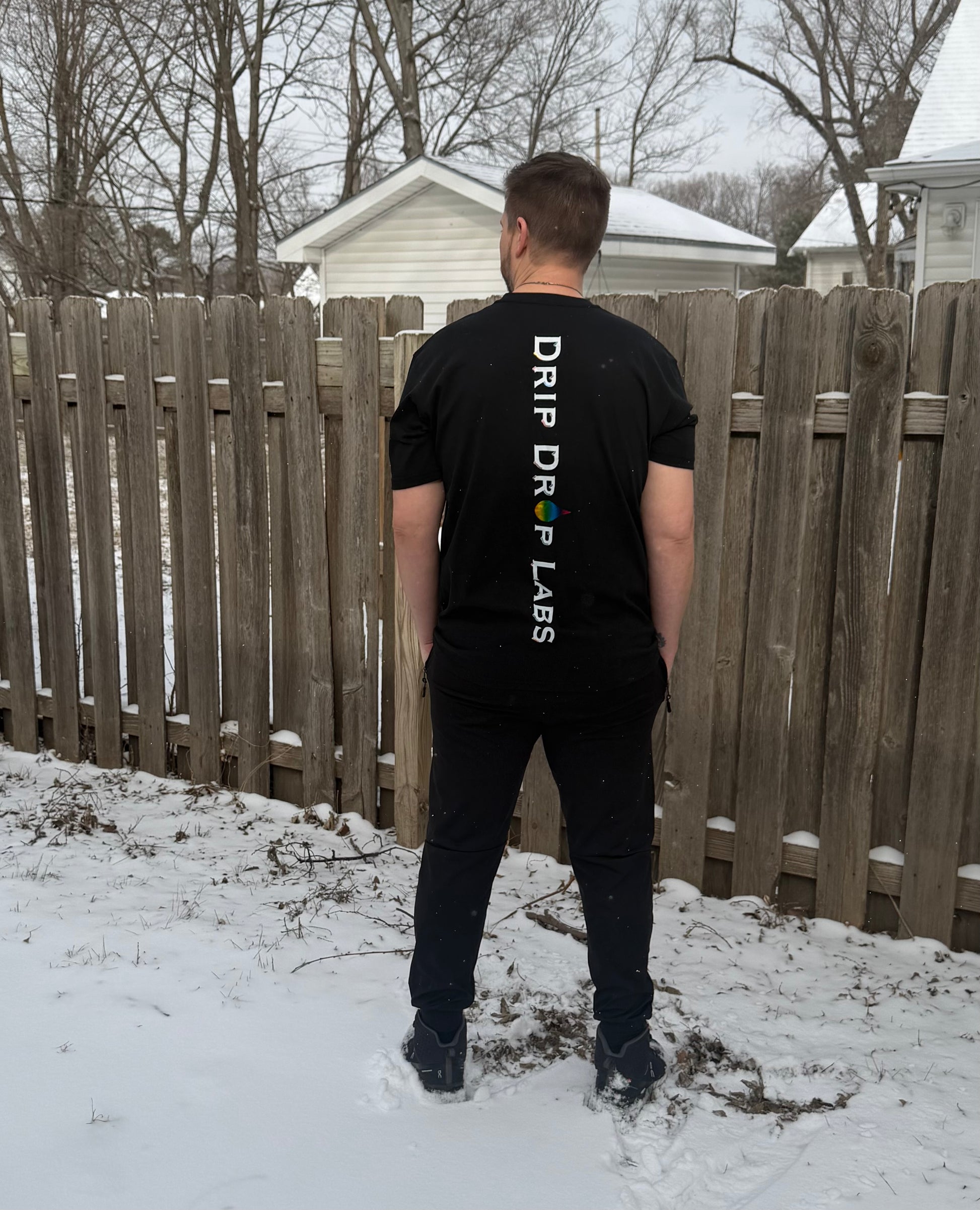Drip Drop Labs Prism Flow Tee: black T-shirt with colorful geometric prism design on the front, casual fit, men's fashion.