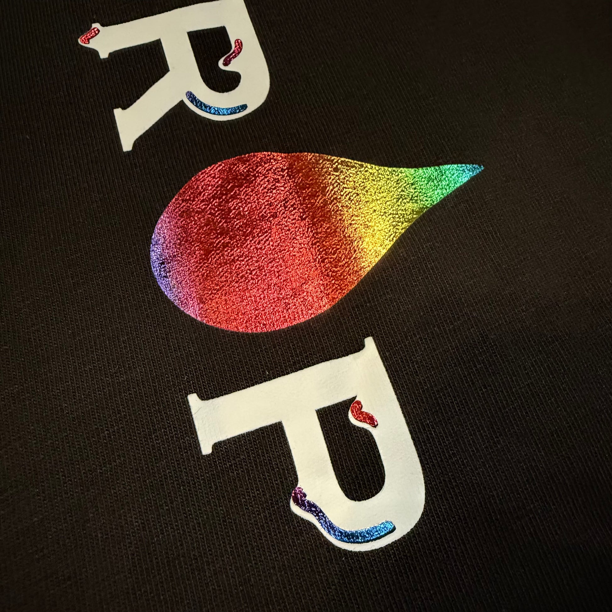 Drip Drop Labs Prism Flow Tee T-shirt featuring a vibrant geometric design in bold colors on soft fabric.