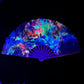 Drip Drop Labs Eye of the World glow fan displaying a vibrant, illuminated design with multiple blades and colorful lighting effects.