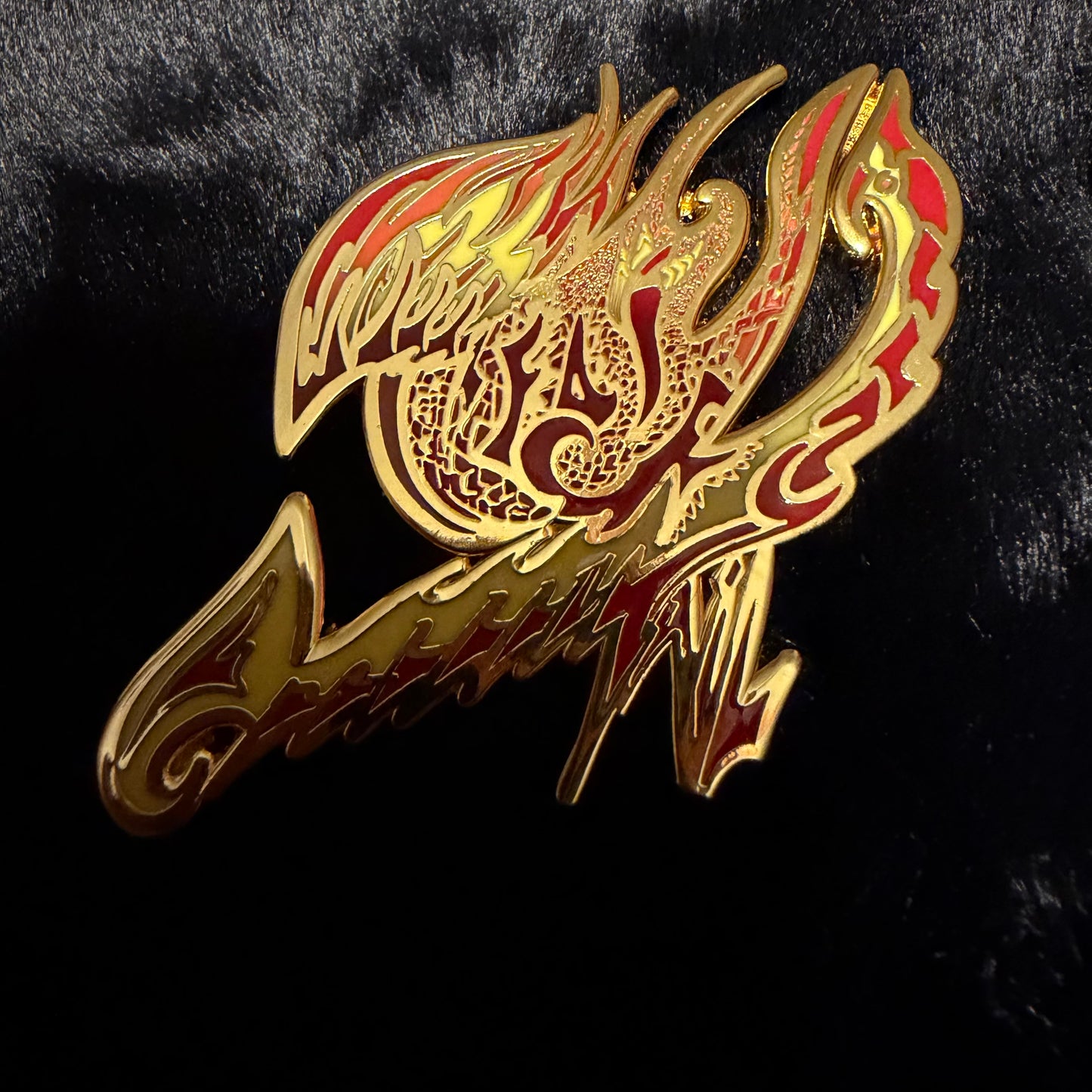 FairyTailz pins by Drip Drop Labs featuring colorful, whimsical fairy design on a metal pin back.