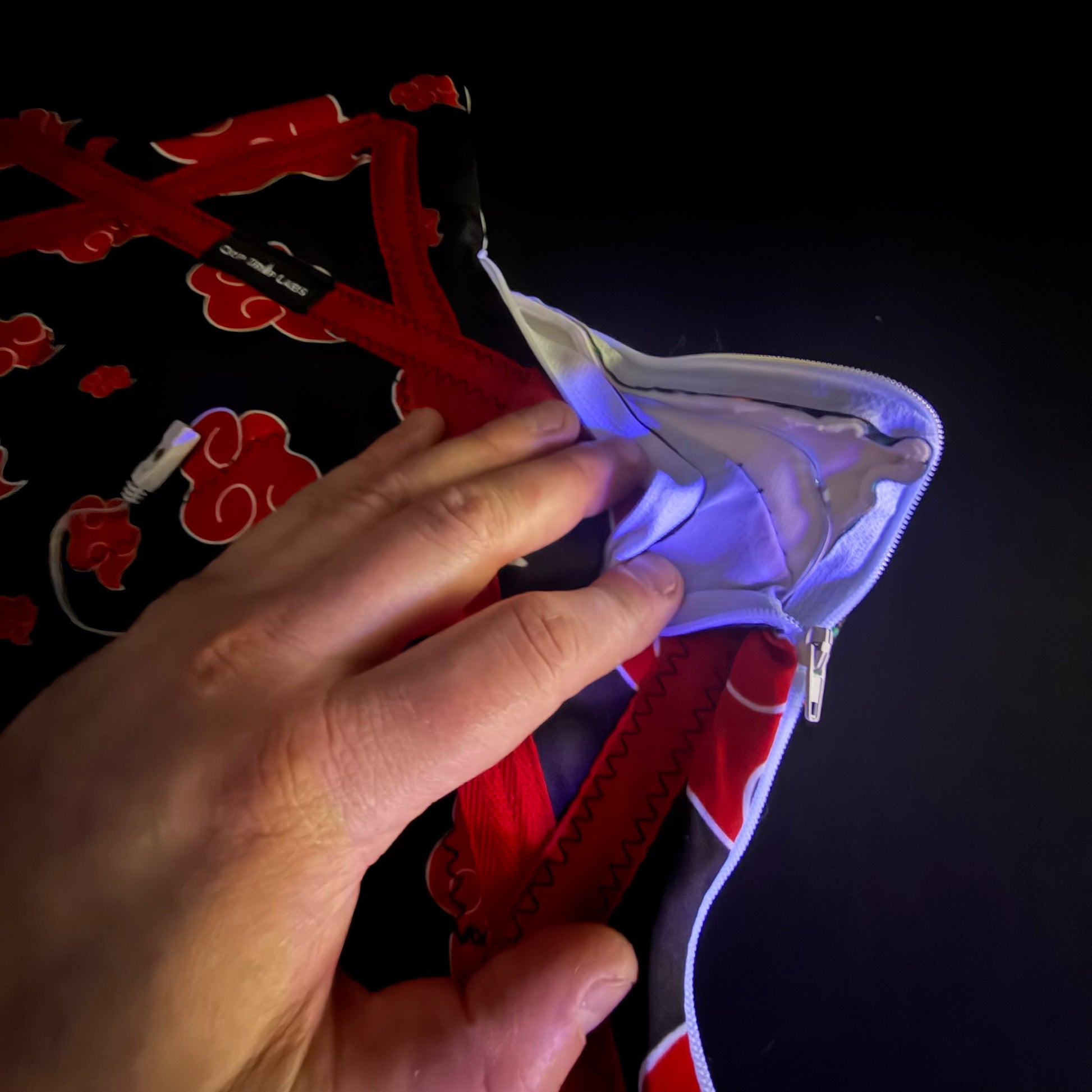 Flowstar Dripsuki toy by Drip Drop Labs featuring colorful, textured silicone design with playful drips and unique shape.