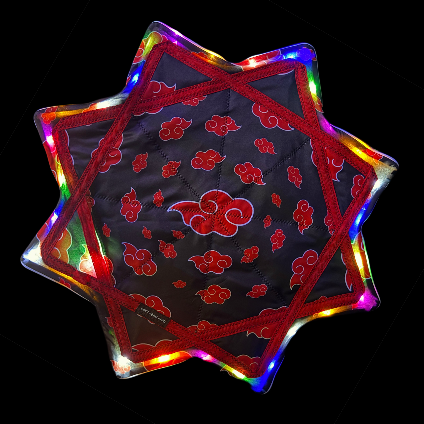 Flowstar Dripsuki toy by Drip Drop Labs featuring a colorful, playful design with multiple limbs and expressive features.