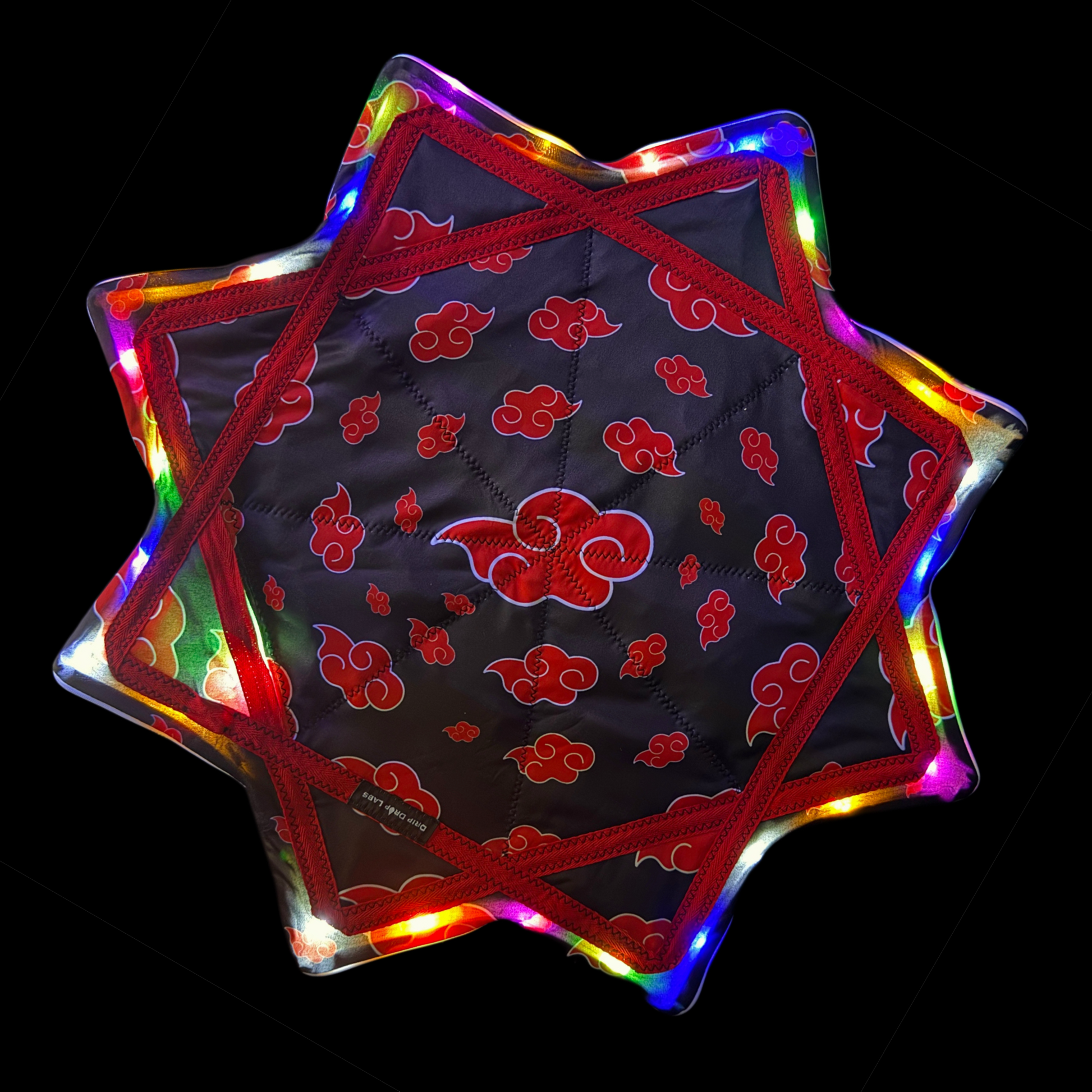 Flowstar Dripsuki toy by Drip Drop Labs featuring a colorful, playful design with multiple limbs and expressive features.
