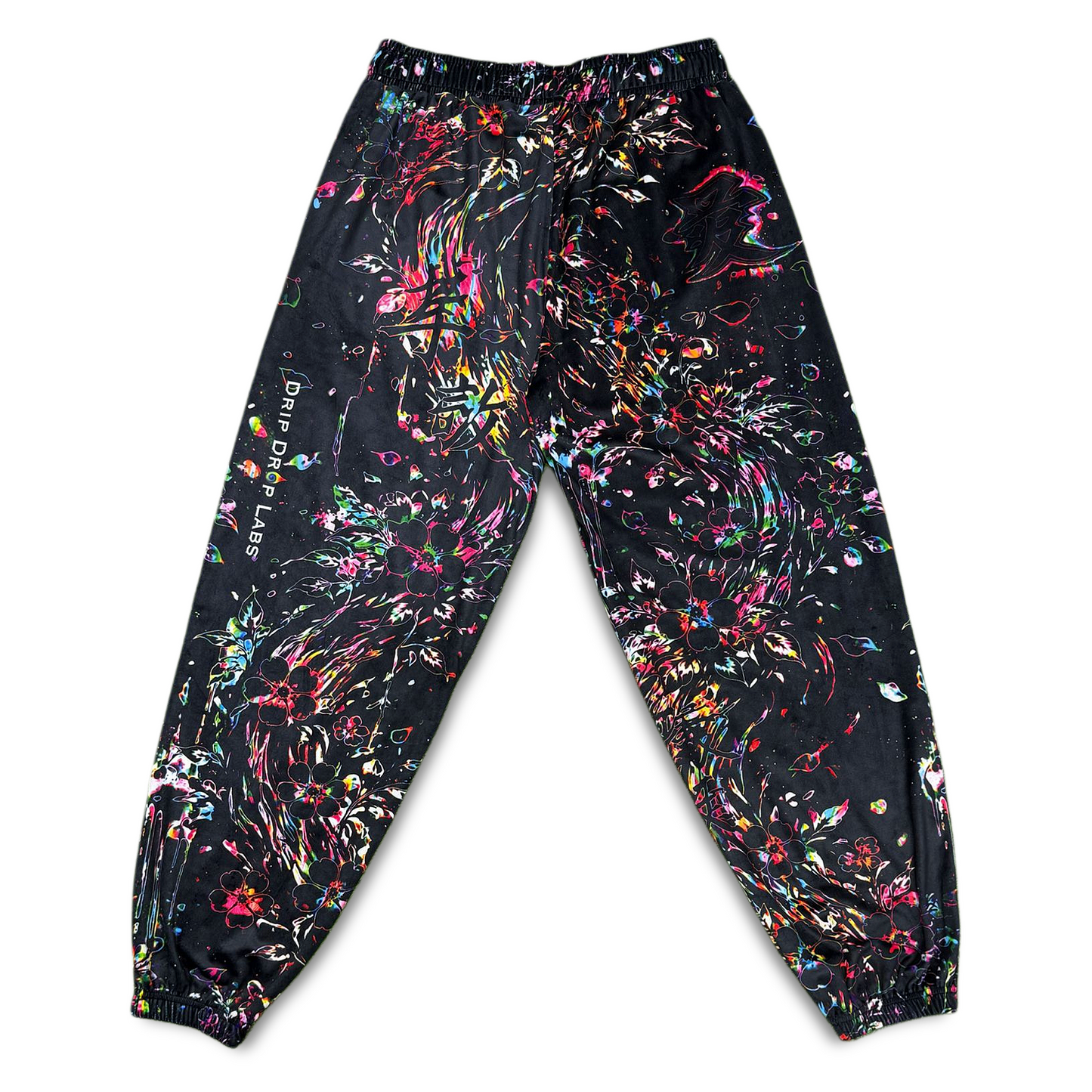 Limited edition Drip Drop Labs Frequency Bloom velvet parachute pants with vibrant floral pattern and relaxed fit.