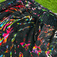 Limited edition Drip Drop Labs Velvet Parachute Pants with vibrant Frequency Bloom pattern, soft velvet fabric and relaxed fit.