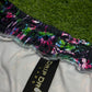 Limited edition Drip Drop Labs Frequency Bloom velvet parachute pants with vibrant floral design and relaxed fit.