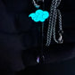 Drip Drop Labs Juicy Cloud Spoon enamel pins featuring colorful cloud design on a white background.