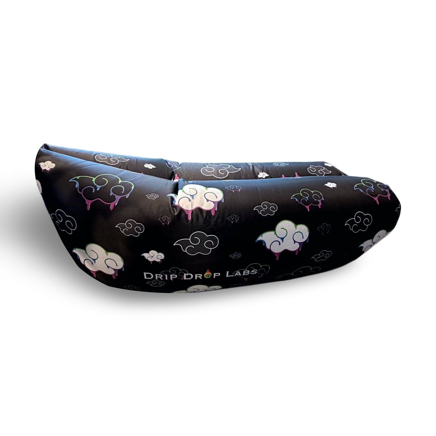 Juicy Couch inflatable sofa by Drip Drop Labs, perfect for camping and outdoor festivals, shown fully inflated outdoors.