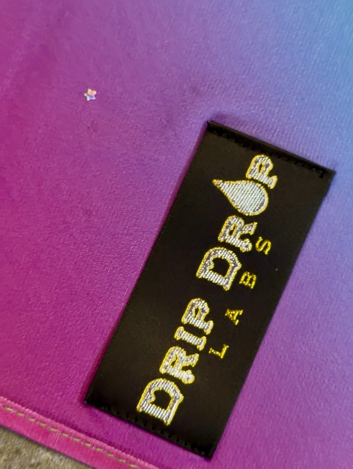 Bright neon Galactic Pashmina scarf by Drip Drop Labs featuring vibrant cosmic patterns and soft, luxurious fabric.