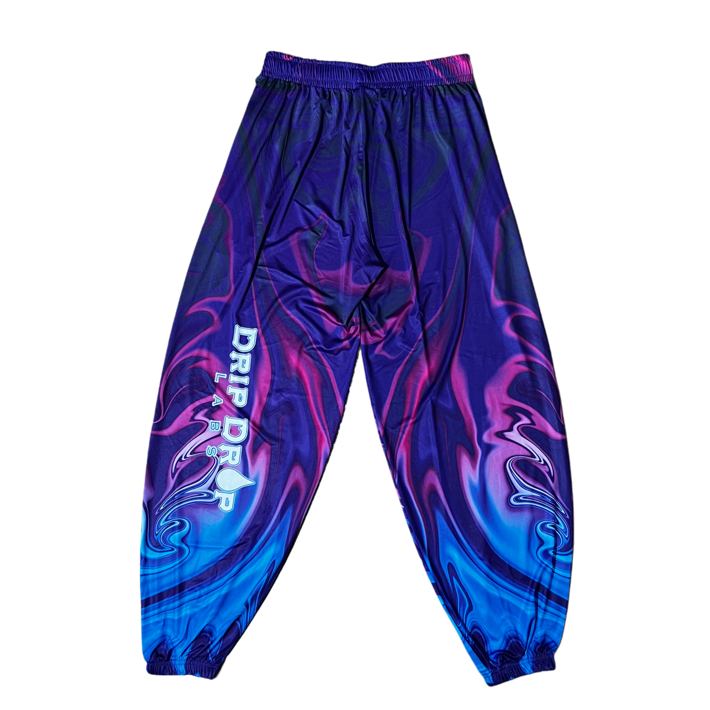 Neon Waves parachute pants by Drip Drop Labs featuring vibrant neon wave patterns and a relaxed, wide-leg fit.