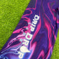 Bright neon waves design on Drip Drop Labs parachute pants with a loose, comfortable fit and vibrant colors.