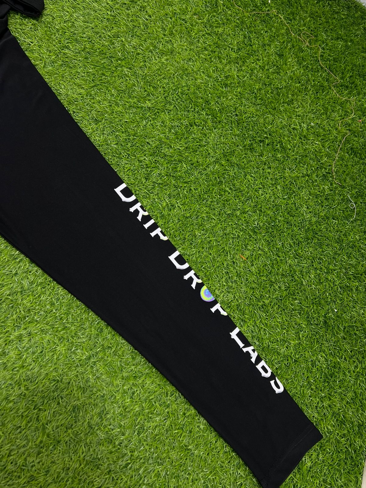Black Drip Drop Labs Performance Hoodie with athletic fit, featuring a front logo and breathable fabric for active wear.