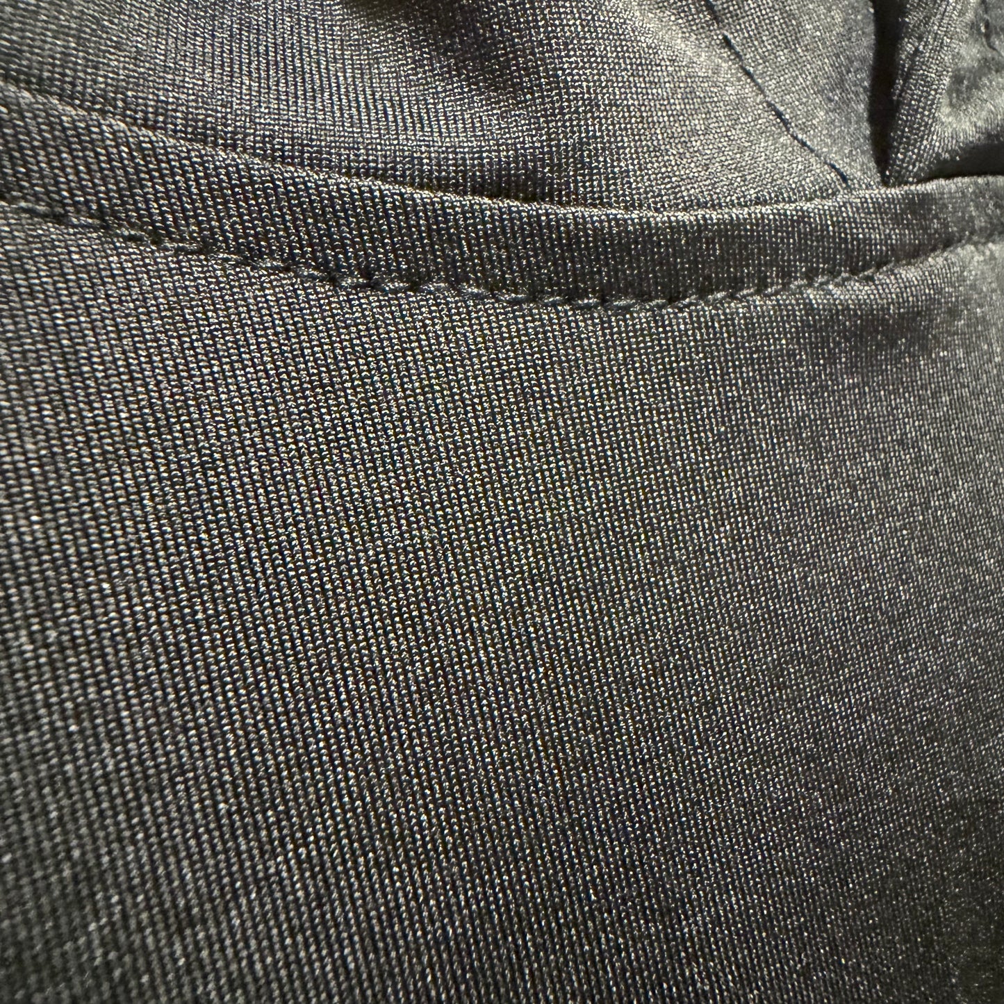 Black Drip Drop Labs Performance Hoodie with athletic fit, featuring a front pocket and logo detail.