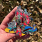 Drip Drop Labs PS Tribute pins featuring detailed enamel design and metal backing, perfect for collectors and fans.