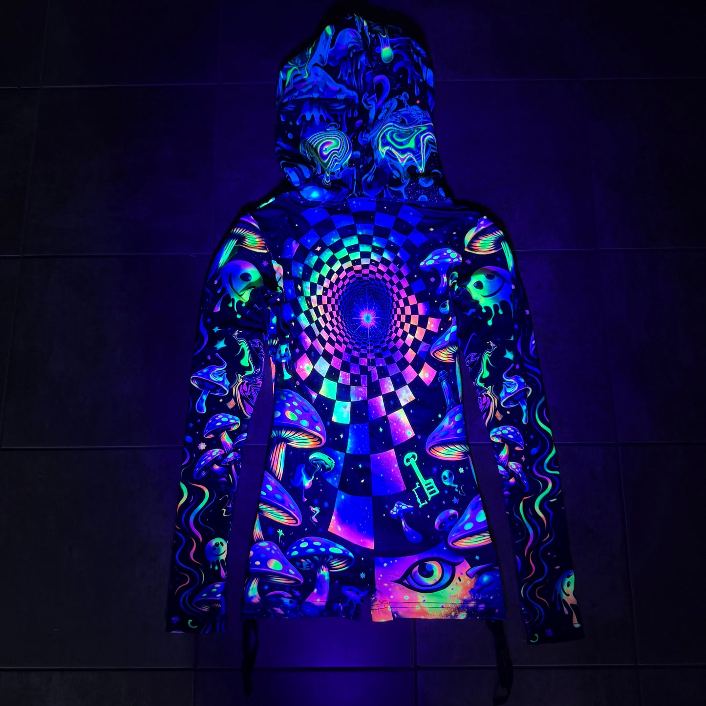 Rainbow Portal Hooded Rave Romper by Drip Drop Labs featuring vibrant psychedelic rainbow patterns and a hood for festival wear.