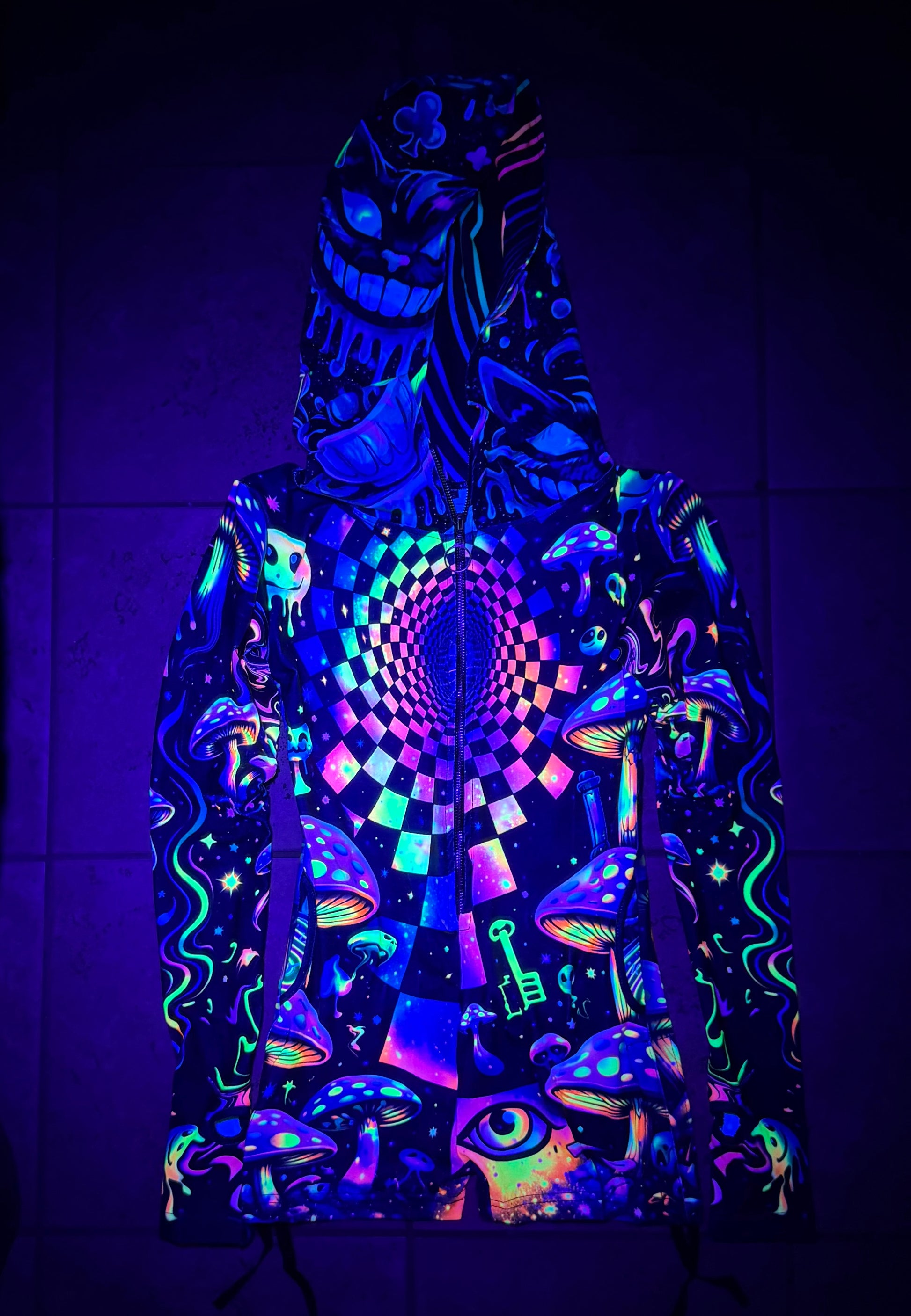 Rainbow Portal Hooded Rave Romper by Drip Drop Labs featuring a psychedelic design and vibrant rainbow colors.