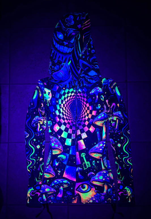 Rainbow Portal Hooded Rave Romper by Drip Drop Labs featuring psychedelic rainbow patterns and a hood for festival wear.