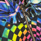 Rainbow Portal Hooded Rave Romper by Drip Drop Labs featuring a psychedelic rainbow design and hood, perfect for festival wear.