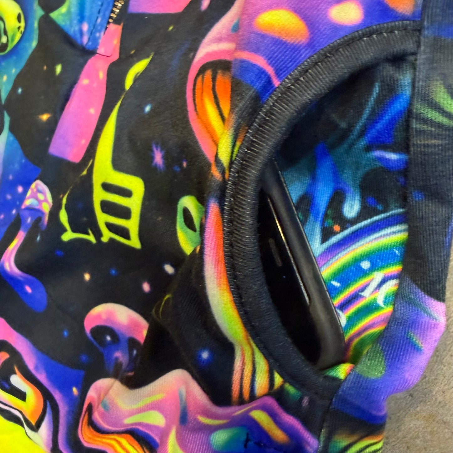 Rainbow Portal Hooded Rave Romper by Drip Drop Labs featuring psychedelic festival-style design and vibrant rainbow portal pattern.