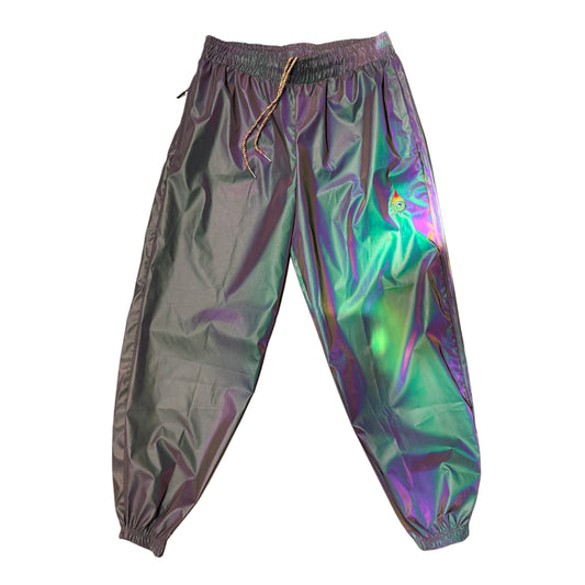 Reflective parachute pants by Drip Drop Labs featuring shiny, lightweight fabric and a relaxed fit for casual wear.