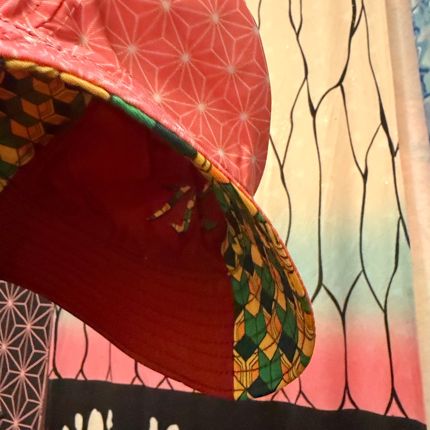 Drip Drop Labs Slayer Flip reversible bucket hat featuring bold design, versatile style, and comfortable fit for casual wear.