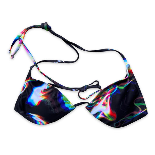 Colorful women’s rave bikini from Drip Drop Labs with vibrant patterns and adjustable straps, designed for energetic dancewear.