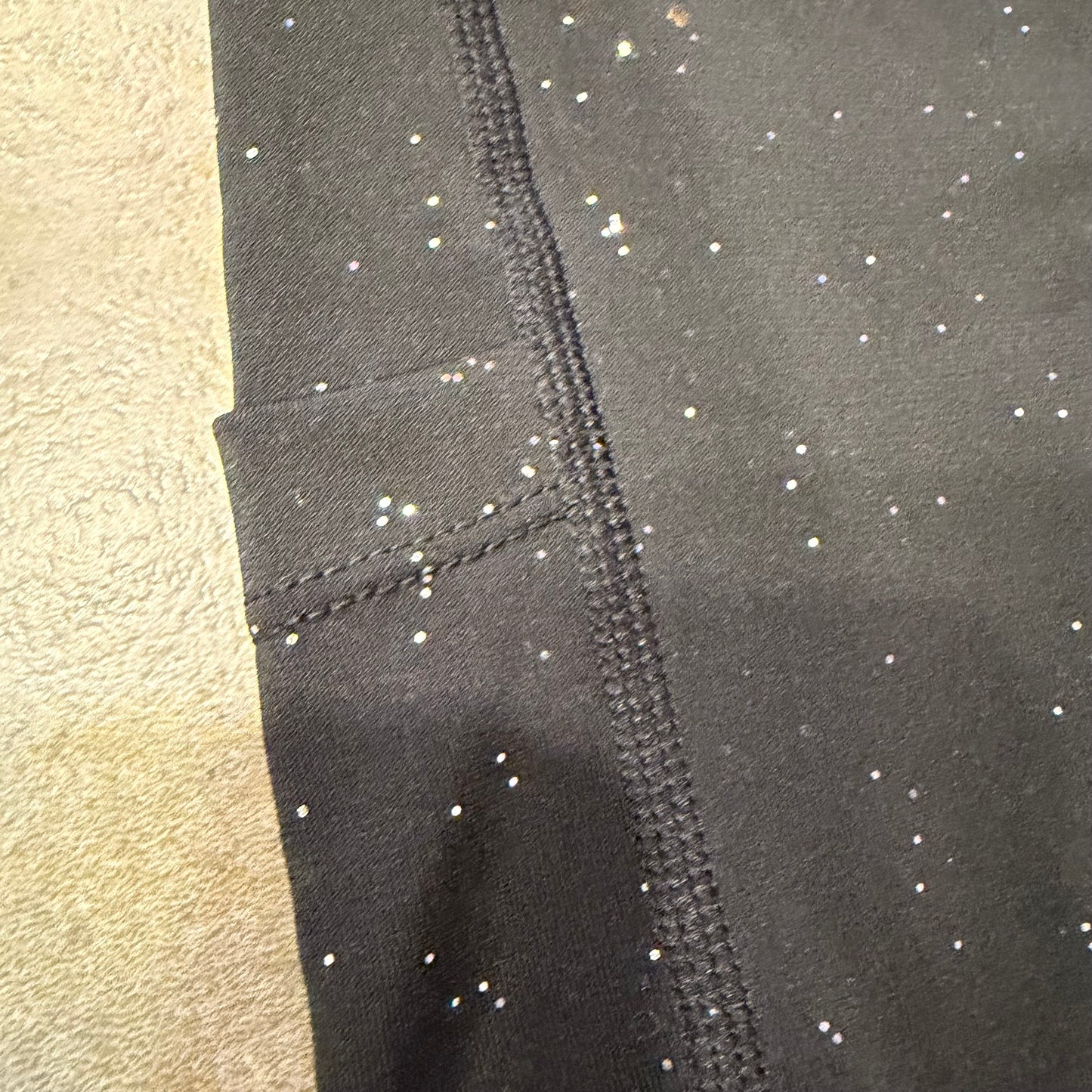 Black Galactic Leggings by Drip Drop Labs featuring cosmic star patterns and a comfortable stretchy fit.