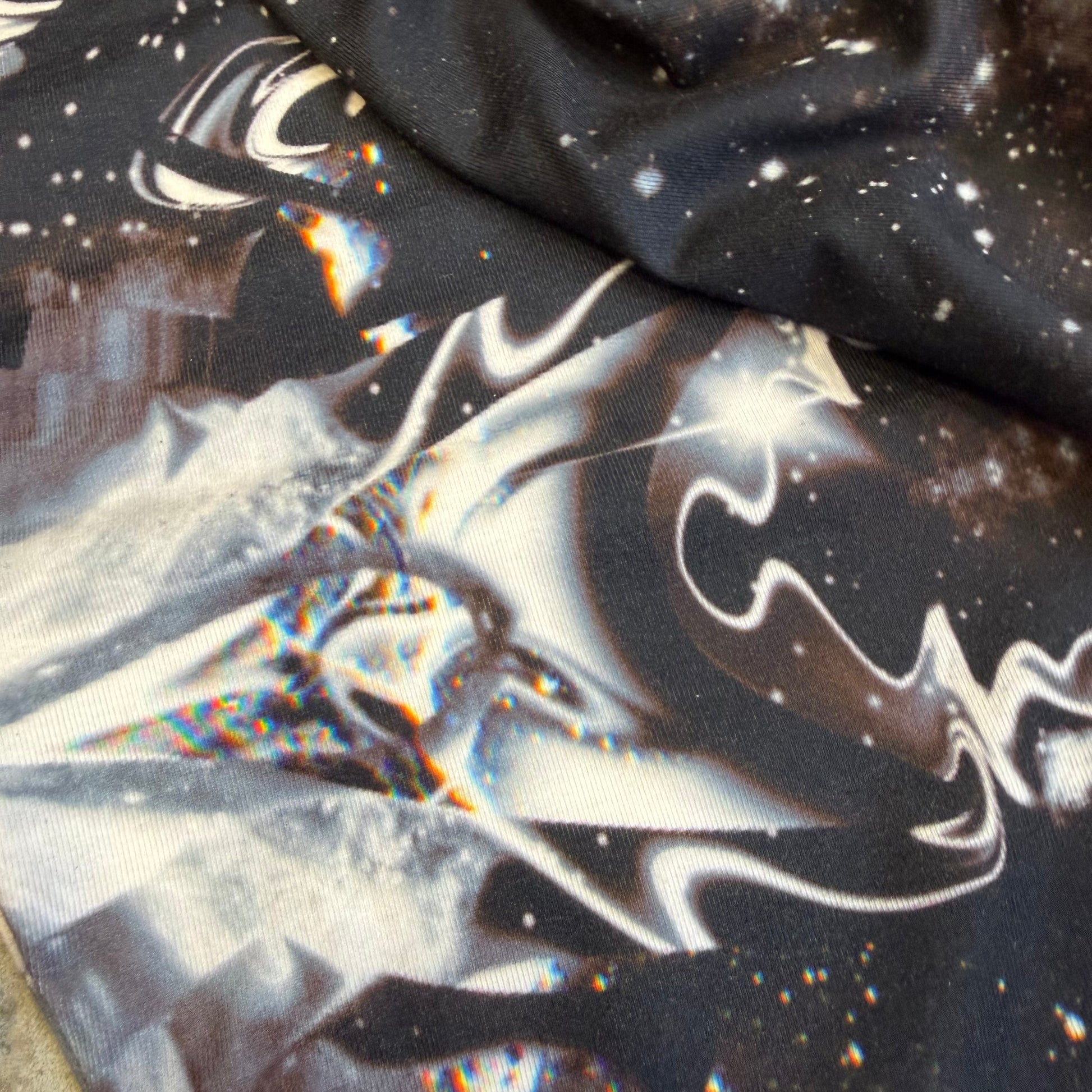 Dark galactic themed hooded rave romper by Drip Drop Labs, featuring a futuristic design and festival-ready fit.
