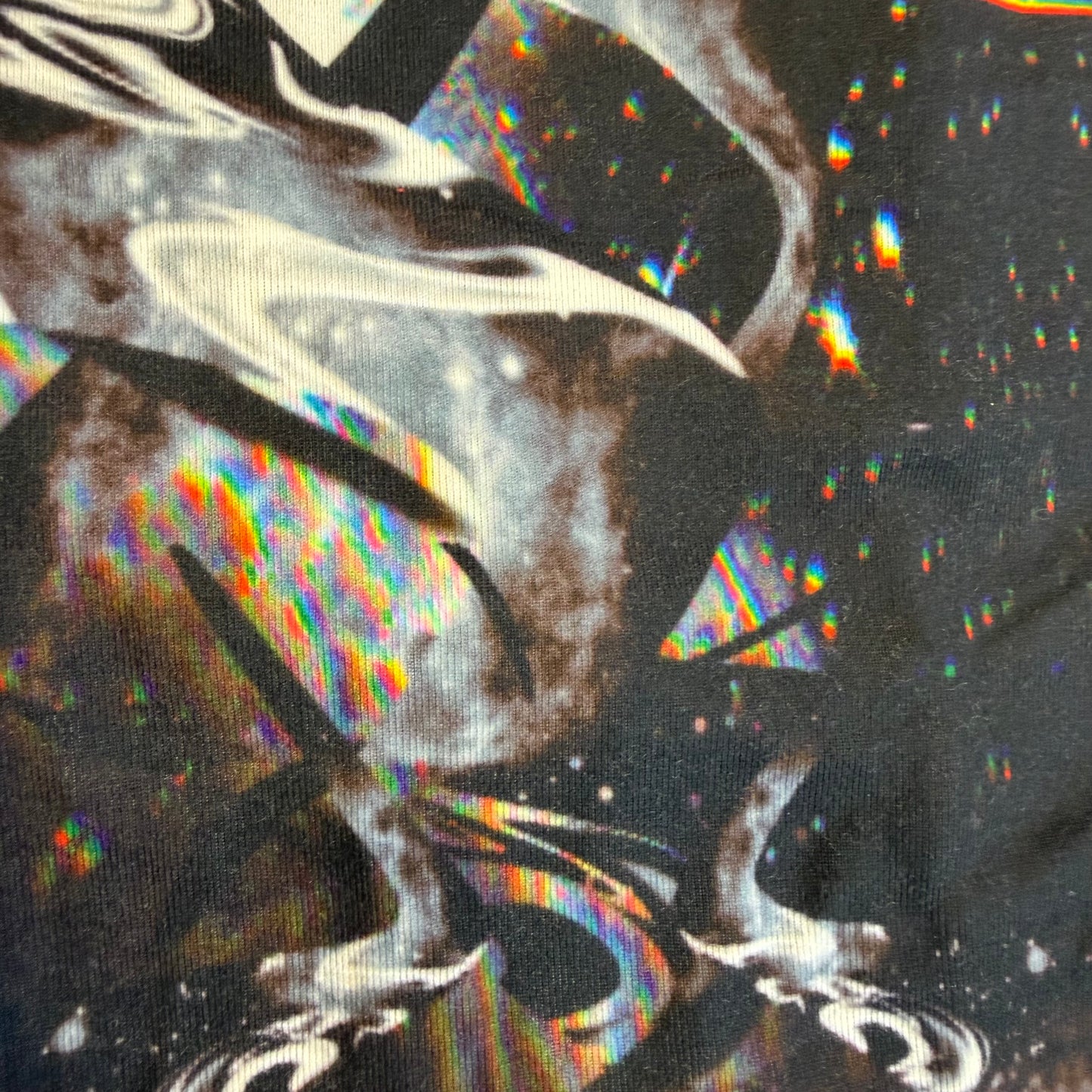 Dark galactic hooded rave romper by Drip Drop Labs featuring cosmic patterns, perfect for festival wear and vibrant dance events.